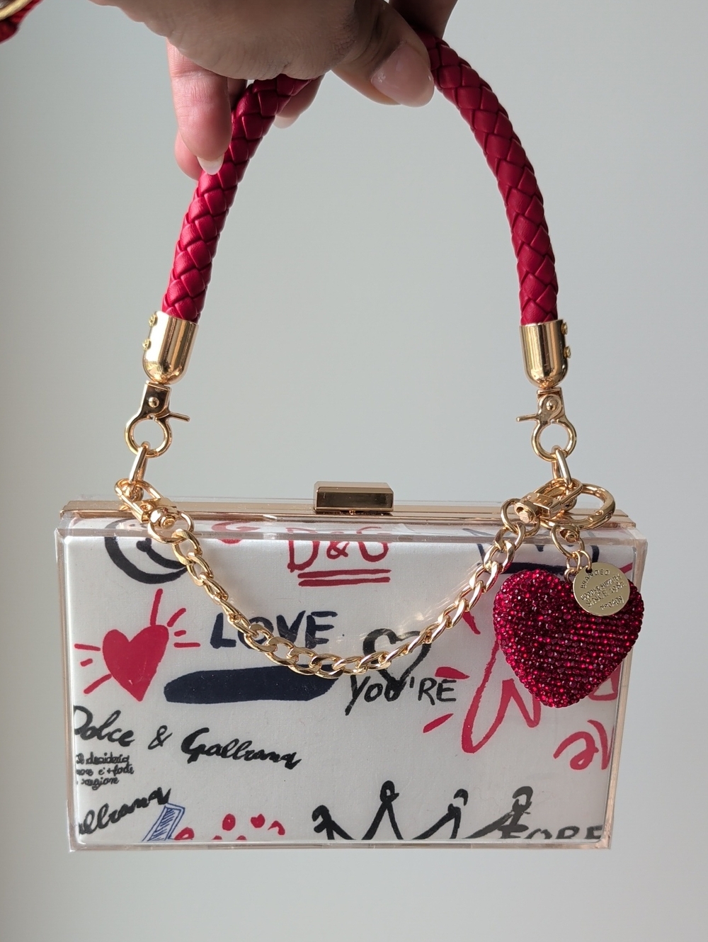 Upcycled Graphic Clutch with Red Accents